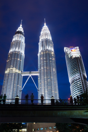 KUALA LUMPUR,MALAYSIA - JULY 11, 2009: The Petronas Towers at night,Petronas Twin Towers are twin skyscrapers in Kuala Lumpur, Malaysia. Malaysia.Malaysia is a member of Asean Economic Community (AEC)のeditorial素材
