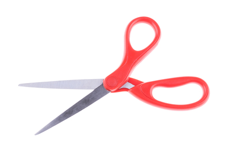 Closeup of one red scissors isolated on a white background. Stationary equipment conceptのeditorial素材