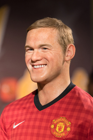 BANGKOK - JAN 29: A waxwork of Wayne Rooney on display at Madame Tussauds on January 29, 2016 in Bangkok, Thailand. Madame Tussauds' newest branch hosts waxworks of numerous stars and celebritiesのeditorial素材