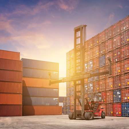 Cargo containers in shipping yard for import,export industrial against blue sky environment for...