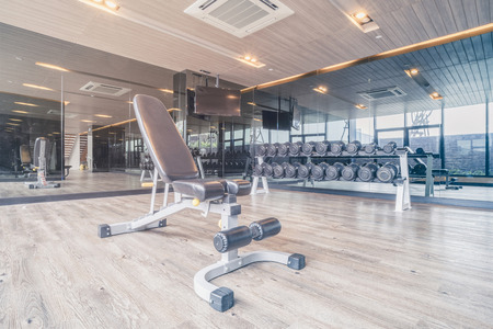 Fitness gym with the modern sport equipment. Fitness gym is a modern lifestyle for sport workoutの写真素材