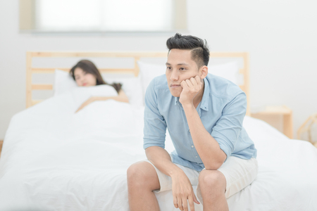 Young asian couple lover having argument and quarrelling with each other.Photo design for family problems and unhappy concept.の写真素材
