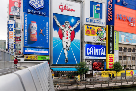 OSAKA,JAPAN-NOV 29: Dotonbori street entertainment area by its eccentric atmosphere and large illuminated signboards on November 29,2016. Dotonbori is one of the principal tourist destination.のeditorial素材