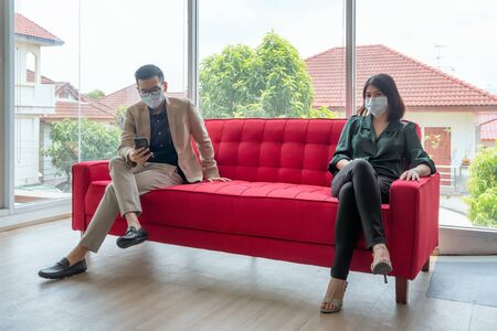 Business employees wearing mask during work in office to keep hygiene follow company policy.Preventive during the period of epidemic from coronavirus or covid19.の写真素材