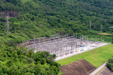 Electrical power station with electric Power Transition Line system in mountain areaの写真素材