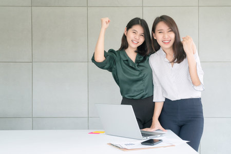 Business employee enjoy and happy to work at company office with positive attitude.の写真素材