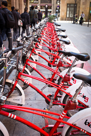 Barcelona, Spain - Feb 19, 2013  Barcelona sharing bike service, known as Bicing, is a municipal bicycle service inaugurated on 2007  It is used to cover small and daily routes within the city and is owned by the Ajuntament de Barcelona  There are more thのeditorial素材