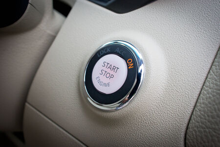 Detail on the start button in a car