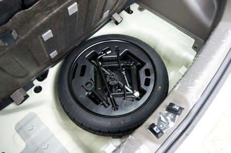 car lifter set for tire changing in the back of carのeditorial素材