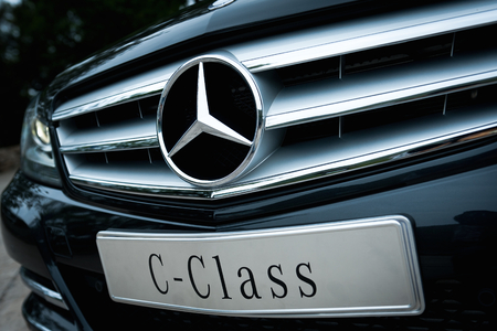 A close-up photo of front part of the Mercedes Benz c-class sedanのeditorial素材