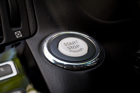 Detail on the start button in a car