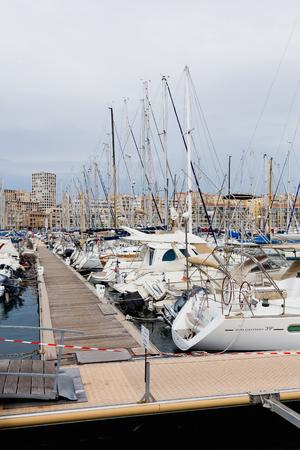 The view on basilica of Notre-Dame-de-la-Ga rde from the Old Port of Marseille.のeditorial素材