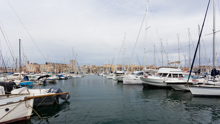 The view on basilica of Notre-Dame-de-la-Ga rde from the Old Port of Marseille.のeditorial素材
