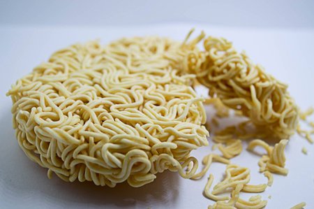 Instant dry noodles circle isolated on white background.の写真素材