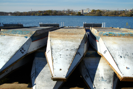 upturned boat on the lakeの写真素材