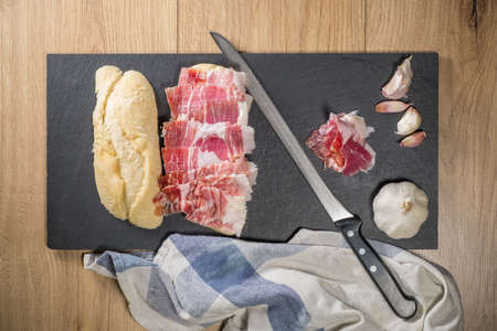 Iberian ham sandwich © rico de bellota with garlicの写真素材