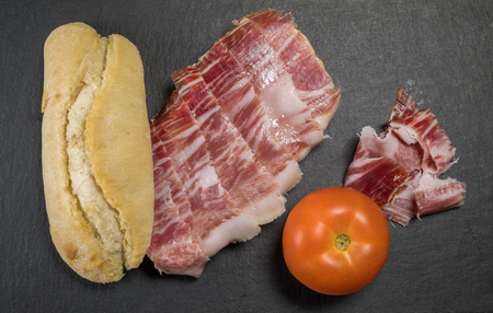 Iberian ham sandwich © rico de bellota with tomatoの写真素材