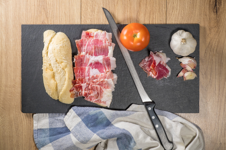 Iberian ham sandwich Â© rico de bellota with tomato and garlicの写真素材