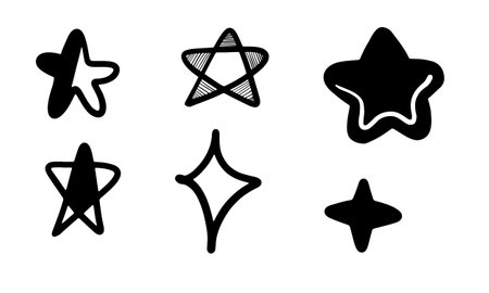 Hand drawn stars set. Star doodles collection on white background.のイラスト素材