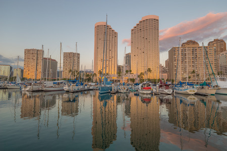 Honolulu, Jan. 1:  The Ala Wai Harbor and surrounding Waikiki hotels on a calm evening.  Honolulu, Hawaii, USA.  January 1, 2015.のeditorial素材