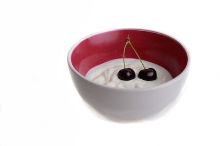 cherries in yogurtの写真素材