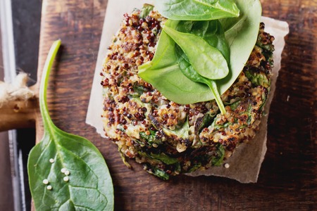 Veggie quinoa burgers with  lettuce, tomato and spinachの写真素材