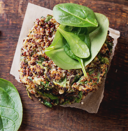 Veggie quinoa burgers with  lettuce, tomato and spinachの写真素材