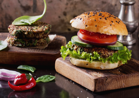 Veggie quinoa burgers with  lettuce, tomato and spinachの写真素材