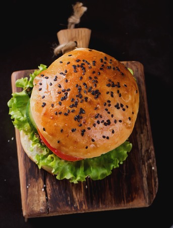 Veggie quinoa burgers with  lettuce, tomato and spinachの写真素材