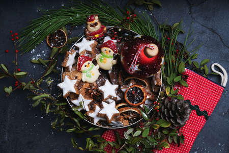 Variety of different Christmas cookies with festive decorations. Flat lay. Top View