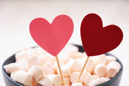 Red and pink hearts in marshmallow on white background. St Valentineâs concept. Close Upの写真素材