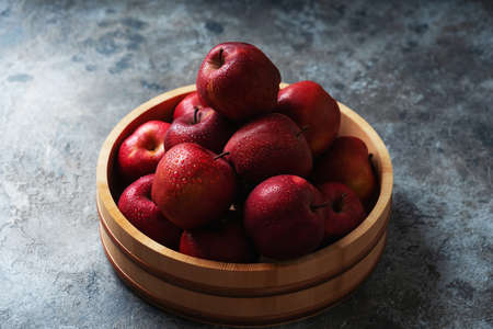 Apples starking in the mesh bag over a metal background. Sustainability and conscious consuming concept. Top View. Flat Layの写真素材