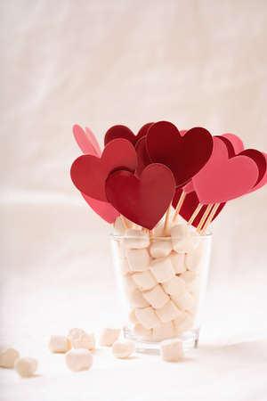 Red and pink hearts in marshmallow on white background. St Valentineâs concept. Close Upの写真素材