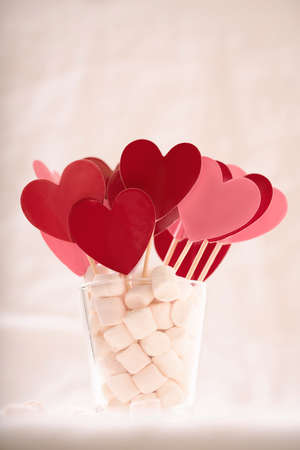 Red and pink hearts in marshmallow on white background. St Valentineâs concept. Close Upの写真素材
