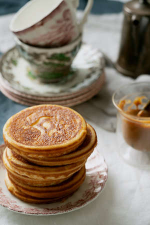 American breakfast , brunch, lunch, meal pancakes  with peanut butter and bananas over a white napkin. Vegan food conceptの写真素材