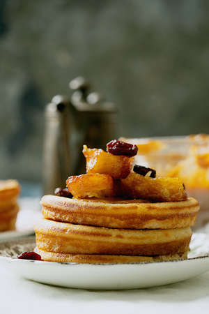 American breakfast , brunch, lunch, meal pancakes  with peanut butter and bananas over a white...