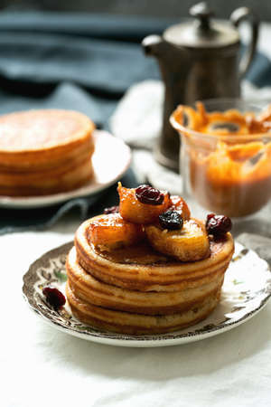 American breakfast , brunch, lunch, meal pancakes  with peanut butter and bananas over a white napkin. Vegan food conceptの写真素材