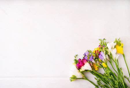 Colorful wildflowers isolated on a white background. Happy Easter concept. Copy space. Top viewの写真素材