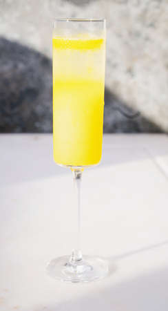 Homemade Mimosa Cocktail. Orange juice with Champaigne. Side view. Selective focus.の写真素材