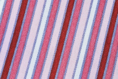 Fabric pink striped texture. Clothes background. Close upの写真素材