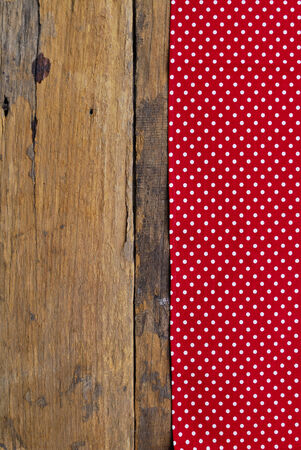 The background made from tablecloth on old wooden tableの写真素材