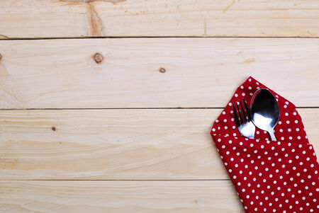 the background made from tablecloth on wooden tableの写真素材