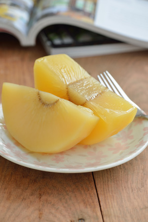 Breadfruit in Syrup Sakay Chuem Sakay Chuem Thai Dessert in plate, Thai food closeup on woodtableの写真素材
