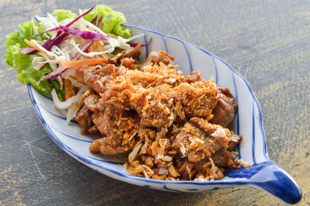 Fried sliced pork with garlic,thai cuisineの写真素材