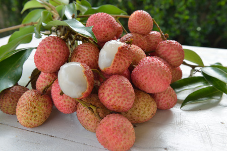 Fresh lychee on a wooden backgroundの写真素材
