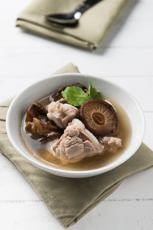 Traditional oriental pork broth Pork ribs with shiitake mushroom soupの写真素材