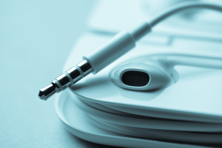 Earphones white color macro shot vintage filterの写真素材