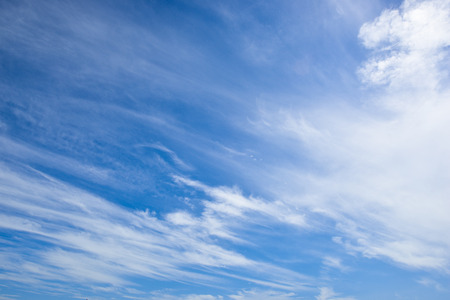 beautiful cloud flowing in the blue skyの写真素材