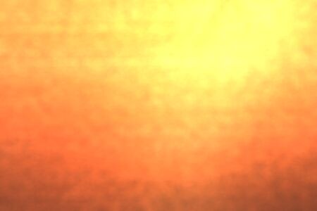 Golden orange colored blurred bokeh  backgroundの写真素材