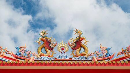 Double dragon on chinese temple roofの写真素材